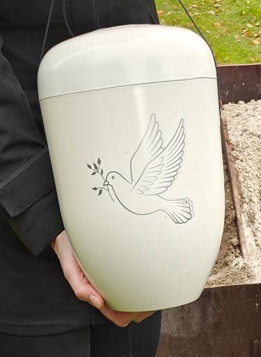 Hvid urne med fredsdue